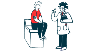 A doctor talks to a patient who sits on an examination table.