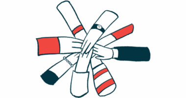 Several hands join together in a circle.