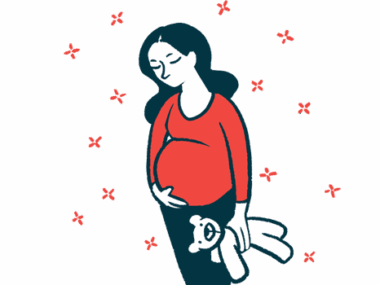 A pregnant woman holds a teddy bear in one hand while cradling her belly with the other.