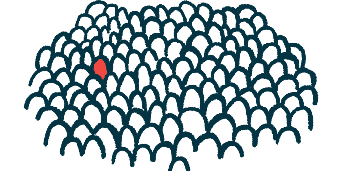 A person among a crowd is highlighted in red.