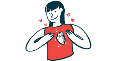 A person wearing a sleeveless shirt uses both hands to gesture to an image of the human heart on its front.