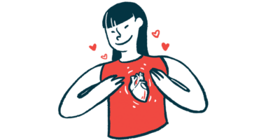 A person wearing a sleeveless shirt uses both hands to gesture to an image of the human heart on its front.