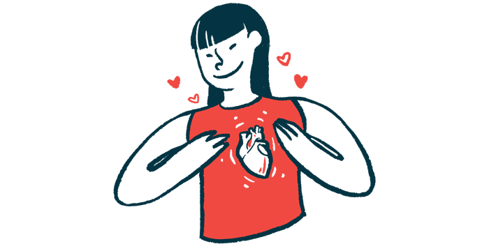 A person wearing a sleeveless shirt uses both hands to gesture to an image of the human heart on its front.