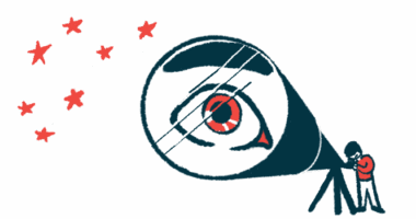 A person's eye is magnified in the lens of a telescope as he looks at stars.