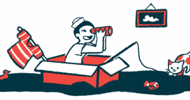 A child wearing a sailor hat looks through binoculars while sitting in a cardboard box with a fishing pole.