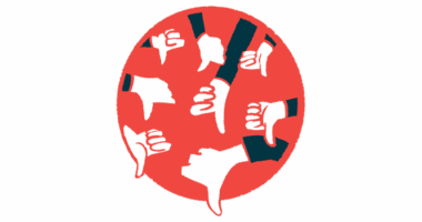 Eight hands show the thumbs-down sign.